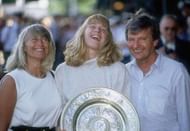 WIMBLEDON - JULY 6:  Tennis Player Steffi Graf of Germany celebrates with her parents Heidi and Peter Graf after winning the 1991 Wimbledon Tennis Championships on July 6,1991 in Wimbledon, England. Graf defeated Gabriella Sabatini of Argentina. 6-4,3-6,8-6.( Photo by: Getty Images)